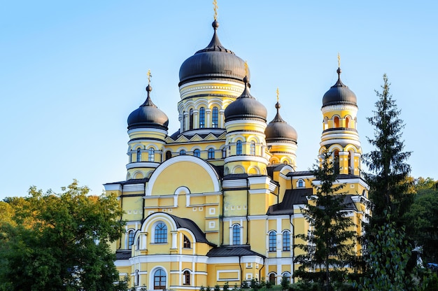 Hancu Monastery and church among greenery in Moldova