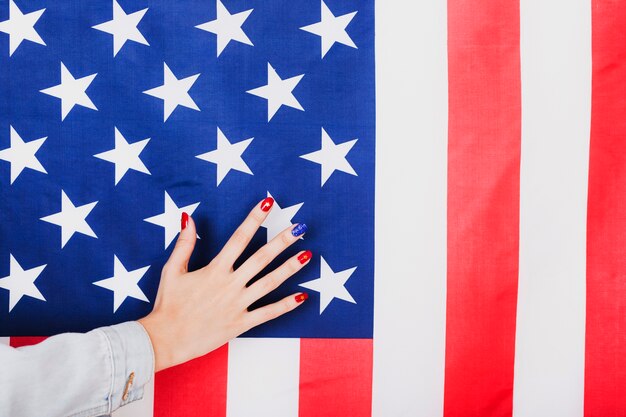 Hand on american flag