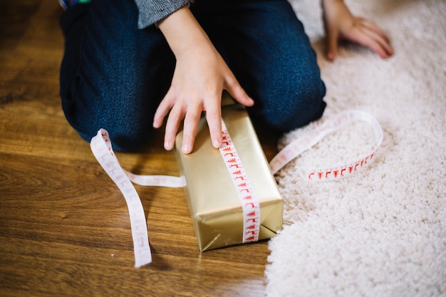 Hand and christmas present