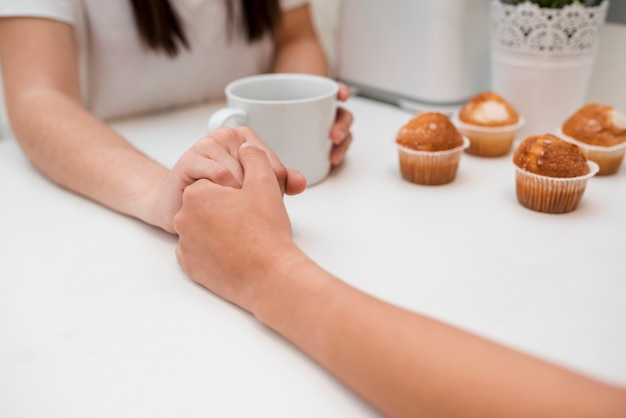 Hand in hand of young couple