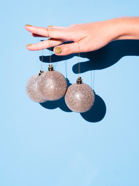 Free Photo hand holding decoration balls