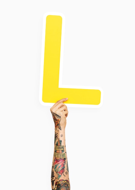 Free photo hand holding the letter l