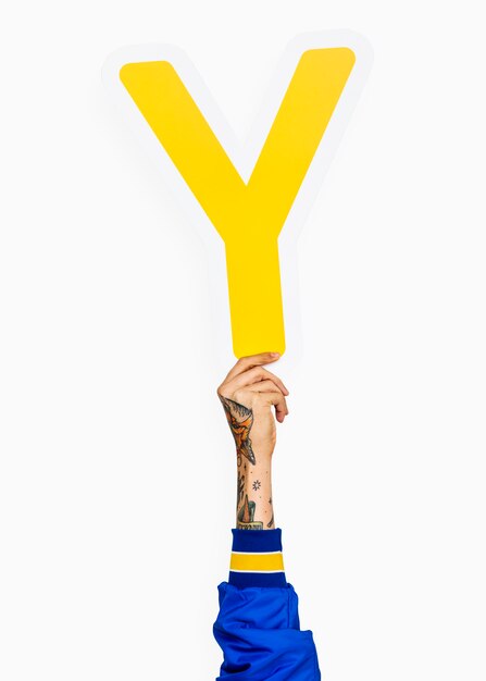 Hand holding letter Y sign