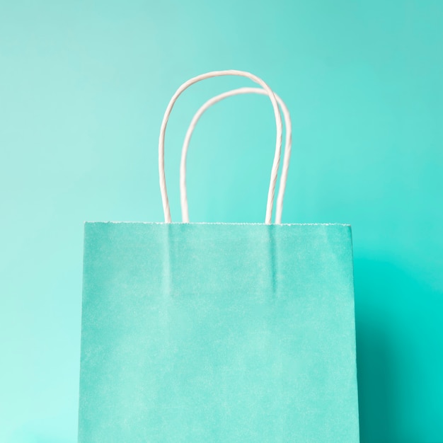 Hand holding paper bag