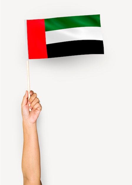 Hand showing flag of United Arab Emirates