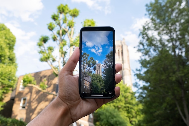 Hand taking beautiful photos with smartphone