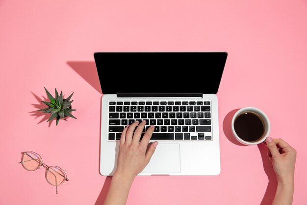 Hand using gadgets, device on top view, blank screen