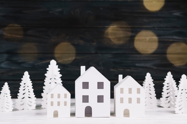 Free Photo handmade paper houses and fir trees