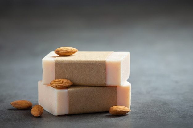 Handmade soap almond on dark background