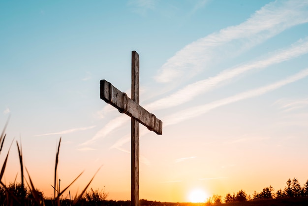 Free photo a handmade wooden cross over sky