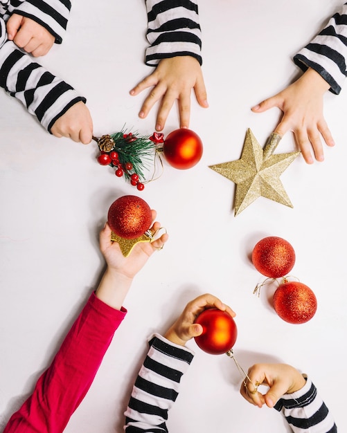 Hands and christmas balls