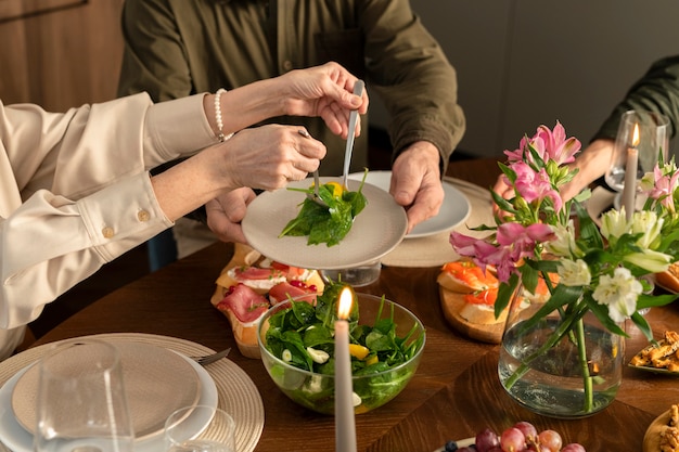 Free photo hands holding cutlery close up