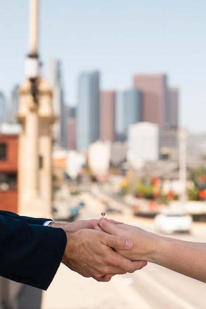 Free Photo hands holding each other and  engagement ring