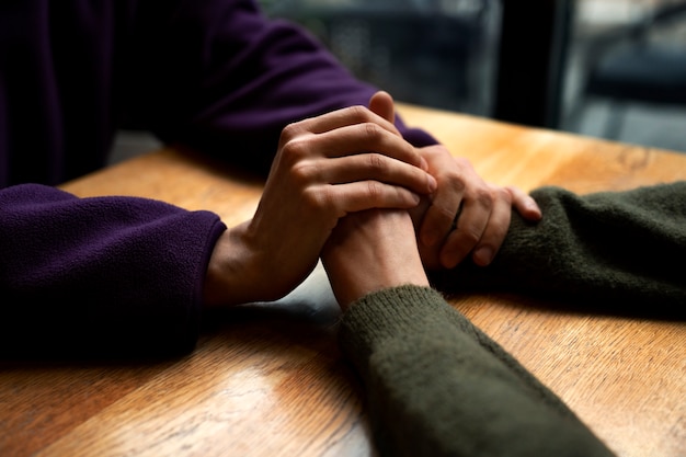 Free Photo hands holding each other for support