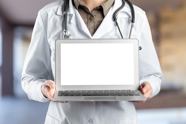 Hands of medical doctor woman with laptop