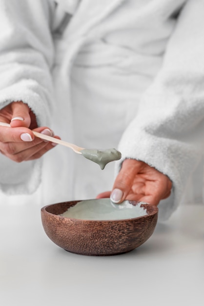 Hands preparing remedy close-up