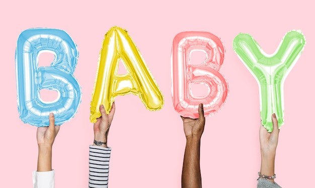 Hands showing baby balloons word