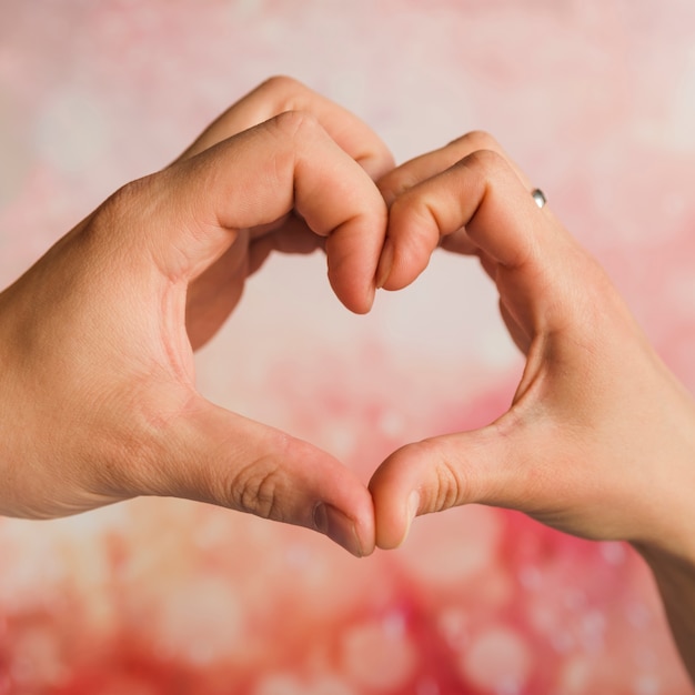 Free photo hands showing heart sign