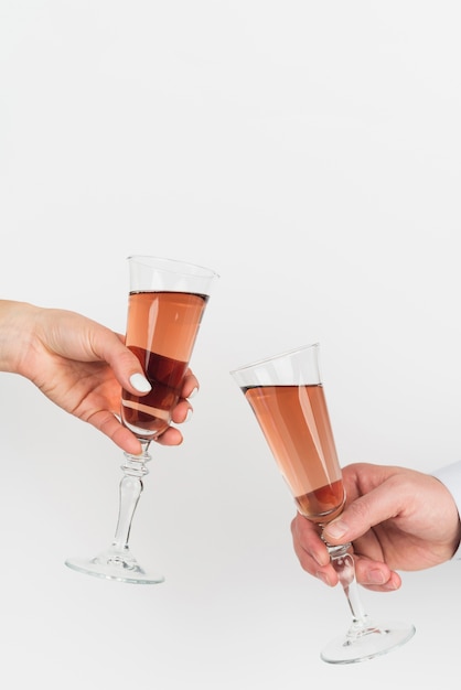 Free photo hands toasting champagne glasses