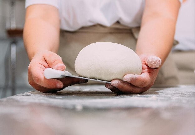 hands working in bake shop