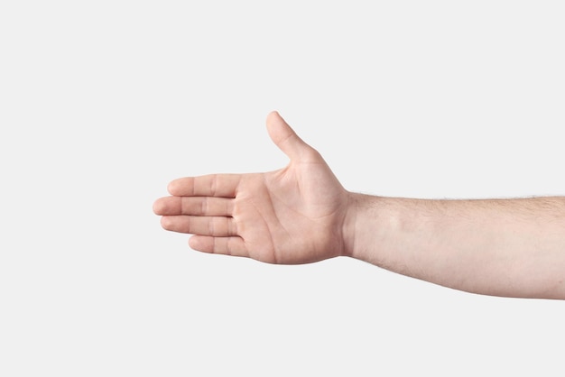 Handshake reaching male hand