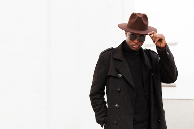 Handsome adult male posing with hat