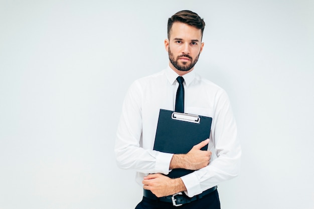 Free photo handsome business guy with folder