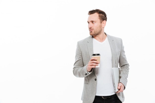 Handsome businessman drinking coffee.