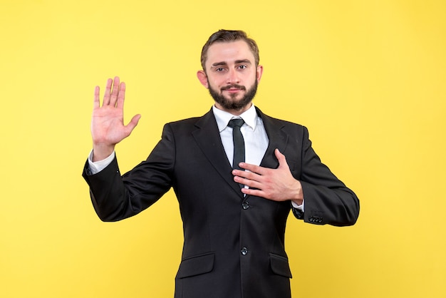 Free photo handsome confident young man standing smiling