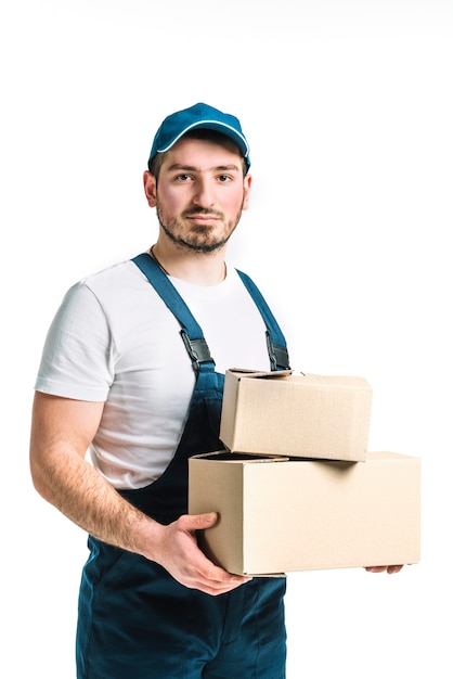 Handsome delivery man with boxes