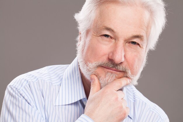 Handsome elderly man with grey beard