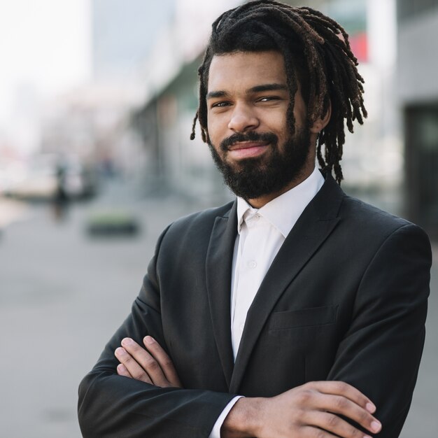 Handsome employee smiling medium shot