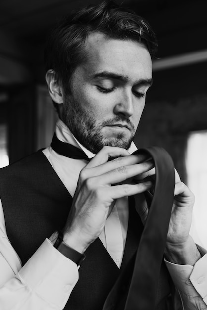 Handsome Groom Dressing Up for Wedding Ceremony