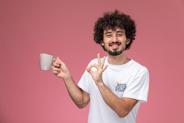 handsome guy doing well done gesture