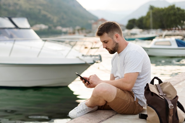 Free Photo handsome male traveler in montenegro