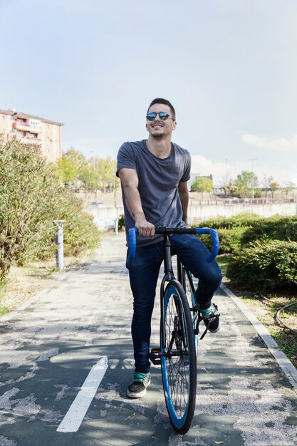 Handsome man on bicycle