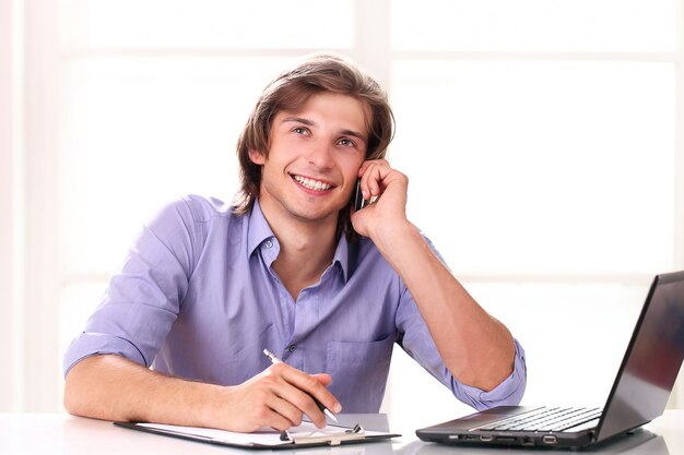 Handsome man calling by cell phone