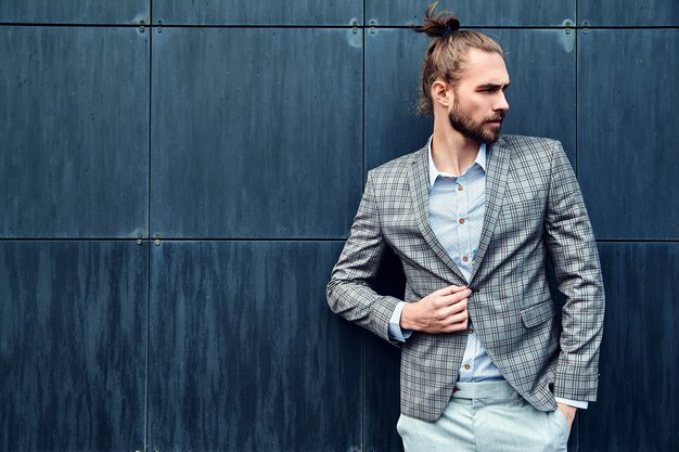 Handsome man in gray checkered suit