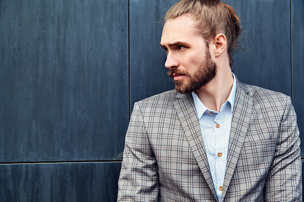 Free Photo handsome man in gray checkered suit