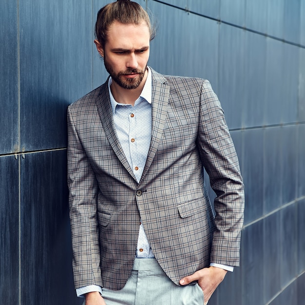 Free Photo handsome man in gray checkered suit