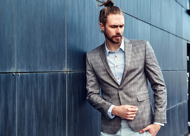 Free Photo handsome man in gray checkered suit