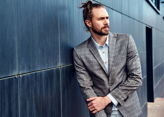 Free Photo handsome man in gray checkered suit