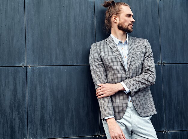 Handsome man in gray checkered suit