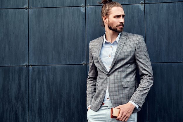 Handsome man in gray checkered suit