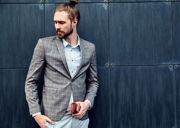 Free Photo handsome man in gray checkered suit