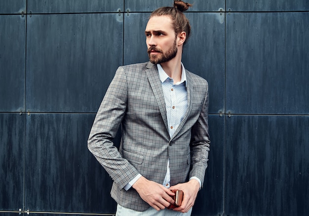 Handsome man in gray checkered suit