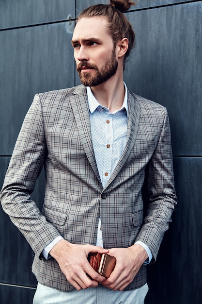 Handsome man in gray checkered suit