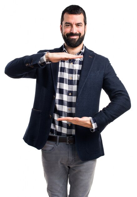 Handsome man holding something