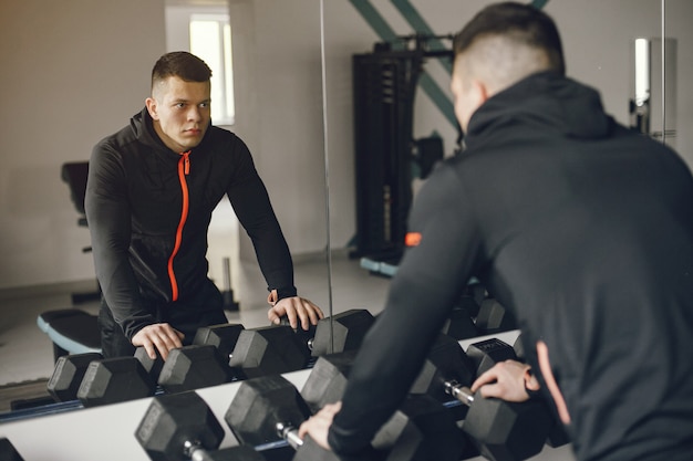 A handsome man is engaged in a gym