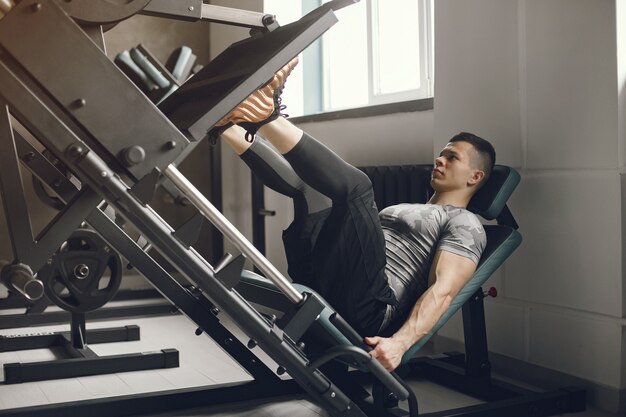 A handsome man is engaged in a gym